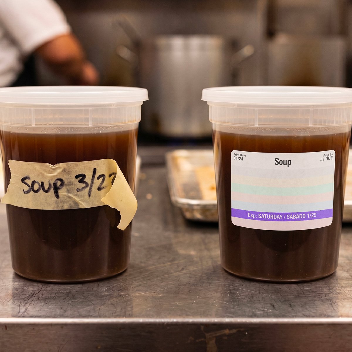 Close-up of a FreshDot label being applied to a deli container
